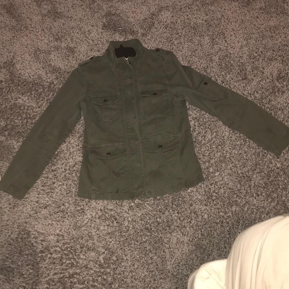 Dark green jacket with gold snaps and zipper.